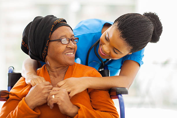 Caregiver assisting a senior with transportation and mobility support for appointments in the Tampa Area, FL